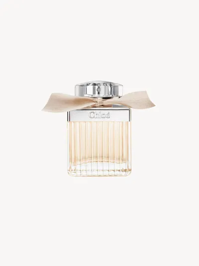 Chloé Eau de Parfum pleated glass bottle with silver plate and beige ribbon — official brand image